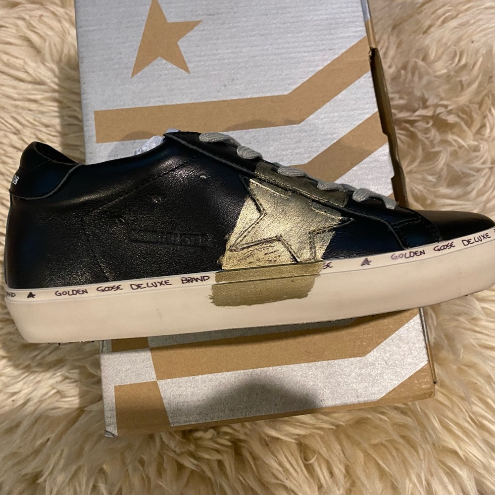 golden knock off goose star & black sneakers